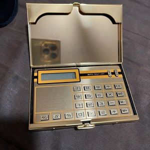 24K. Gold plated Brass calculator case and card Holder.
